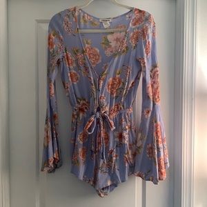 Cute Billabong bell sleeved light blue with floral print romper